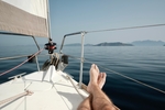 Guest relaxing on a sailing trip